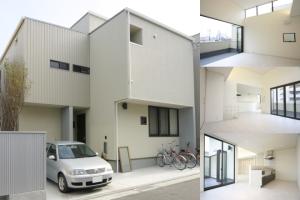 ２階ＬＤＫが裏庭と連続する２階建住宅