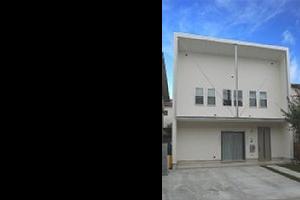 片流れ屋根の家